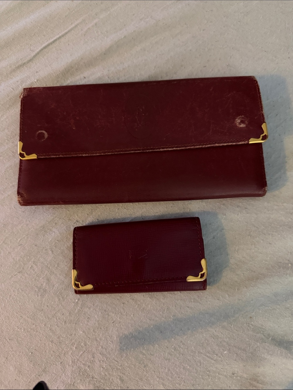 Cartier Burgundy Wallet and Card Holder with Gold Accents